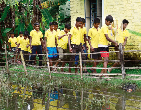 The team carries the STAR Sports Young Heroes trophy to their school building. Pictures by B. Halder